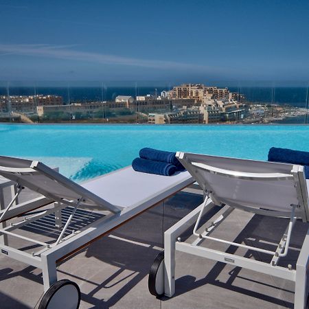 Be.Hotel Saint Julian's Exterior photo The view of the sea from the rooftop pool