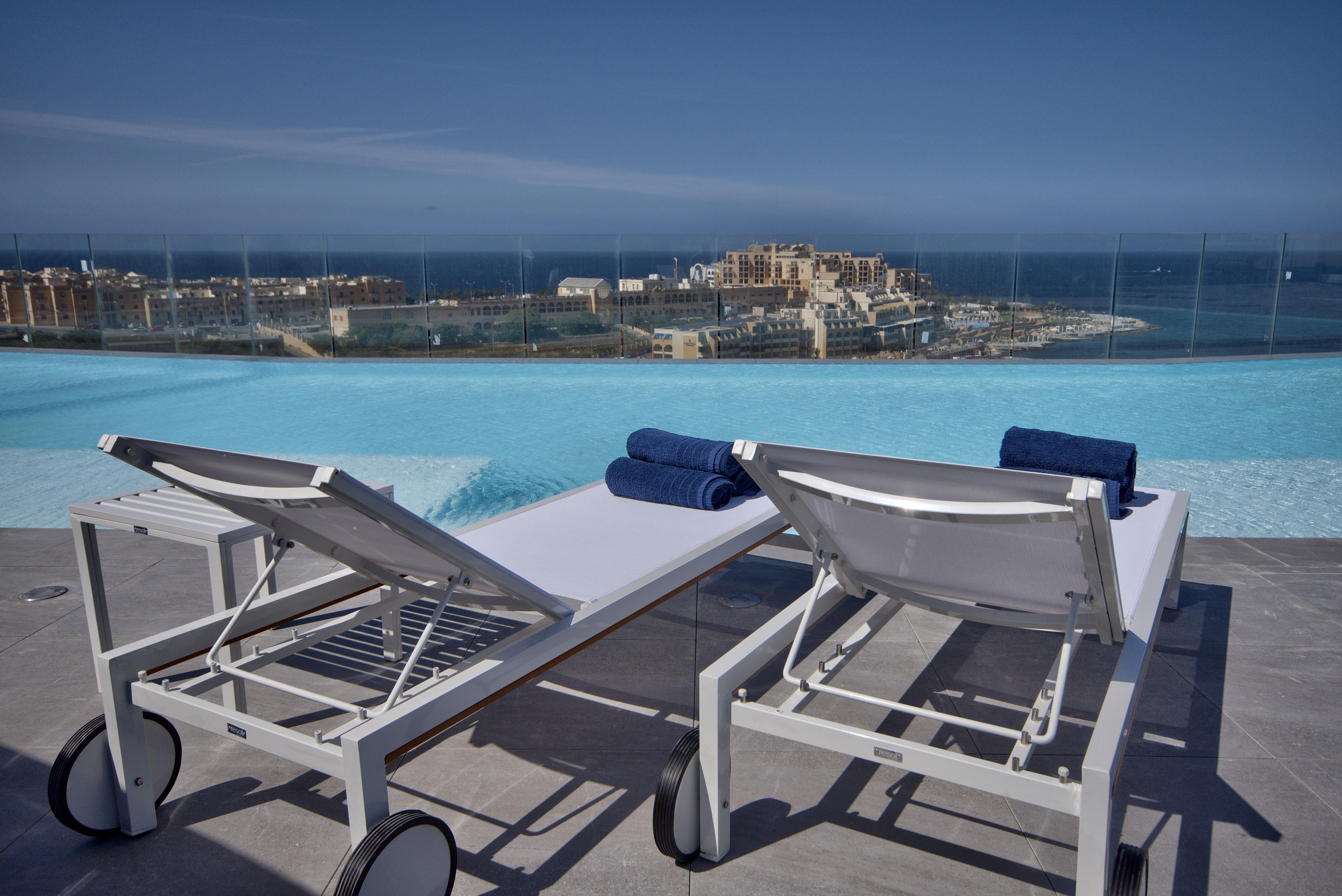 Be.Hotel Saint Julian's Exterior photo The view of the sea from the rooftop pool